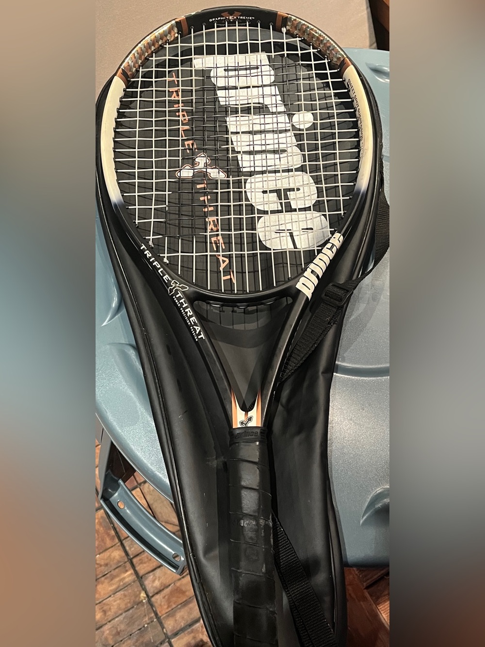Prince Black Tennis Racket with Orange Accents